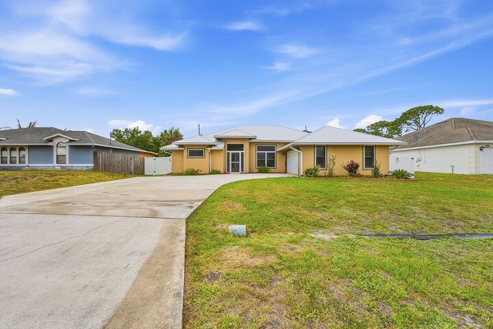 Property Photo:  1280 SW Kalevala Drive  FL 34953 