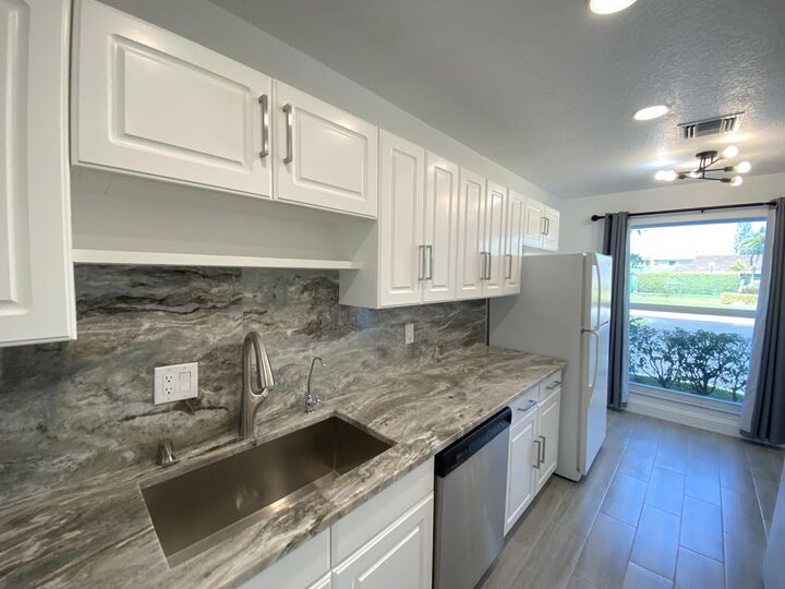 Property Photo:  2450 Black Olive Boulevard A  FL 33445 