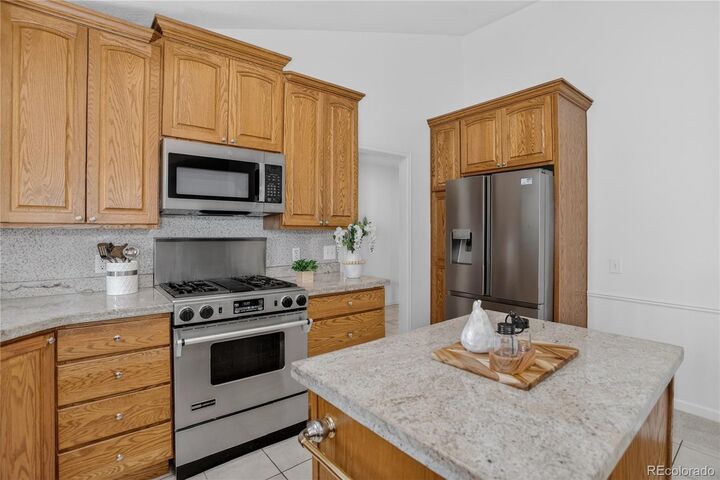 Property Photo:  4749 S Xenophon Street  CO 80465 