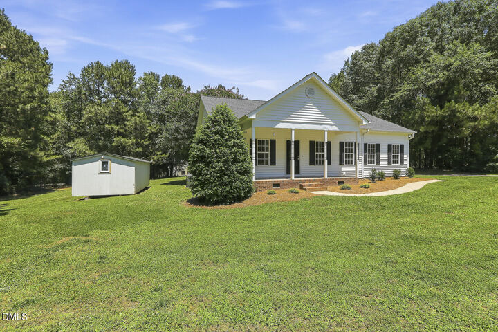 Property Photo:  100 Fire Thorne Lane  NC 27526 
