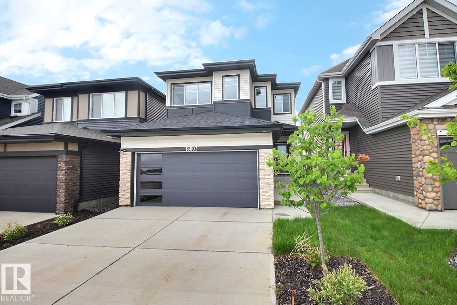 Property Photo:  13007 213 Street NW  AB T5S 0T7 
