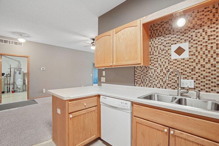 Property Photo:  103 Star Street E 6  MN 55358 