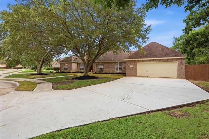 Property Photo: 8135 Medinah Drive TX 77707