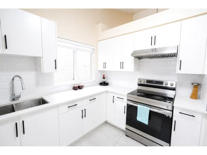 Property Photo: 12458 76B Avenue BC V3W 7W6