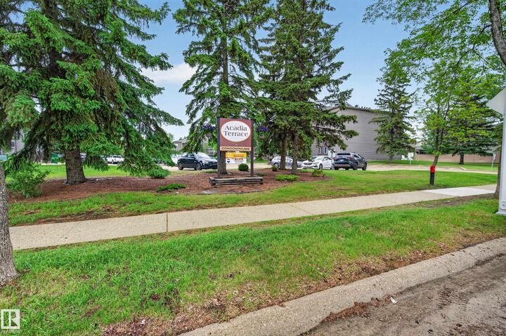 Property Photo: 49 Akins Drive 201 AB T8N 3M6