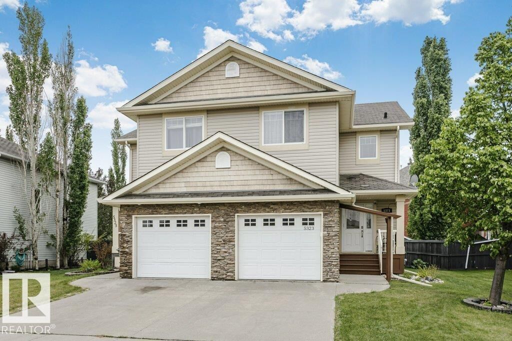 Property Photo:  5323 Rue Parc Street  AB T4X 1W4 