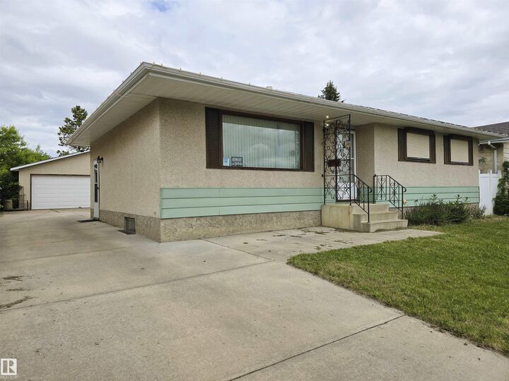 Property Photo:  3718 136A Avenue NW  AB T5A 2P4 