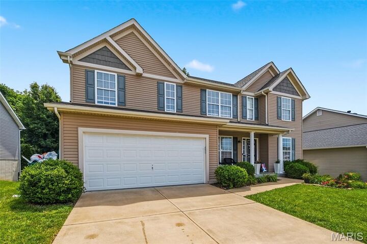 Property Photo:  312 Pearson Court  MO 63304 