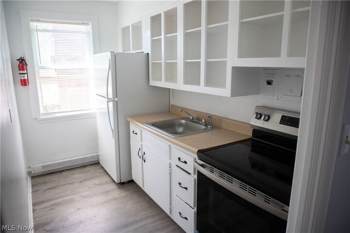 Property Photo:  13833 Cedar Road 205B  OH 44118 