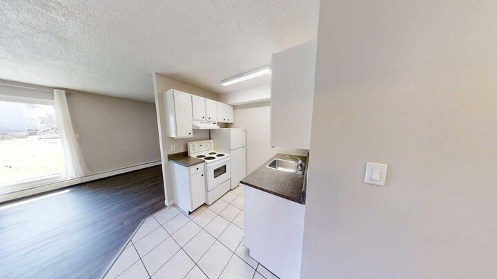 Property Photo:  10028 105 Avenue 2  AB T8V 1H1 