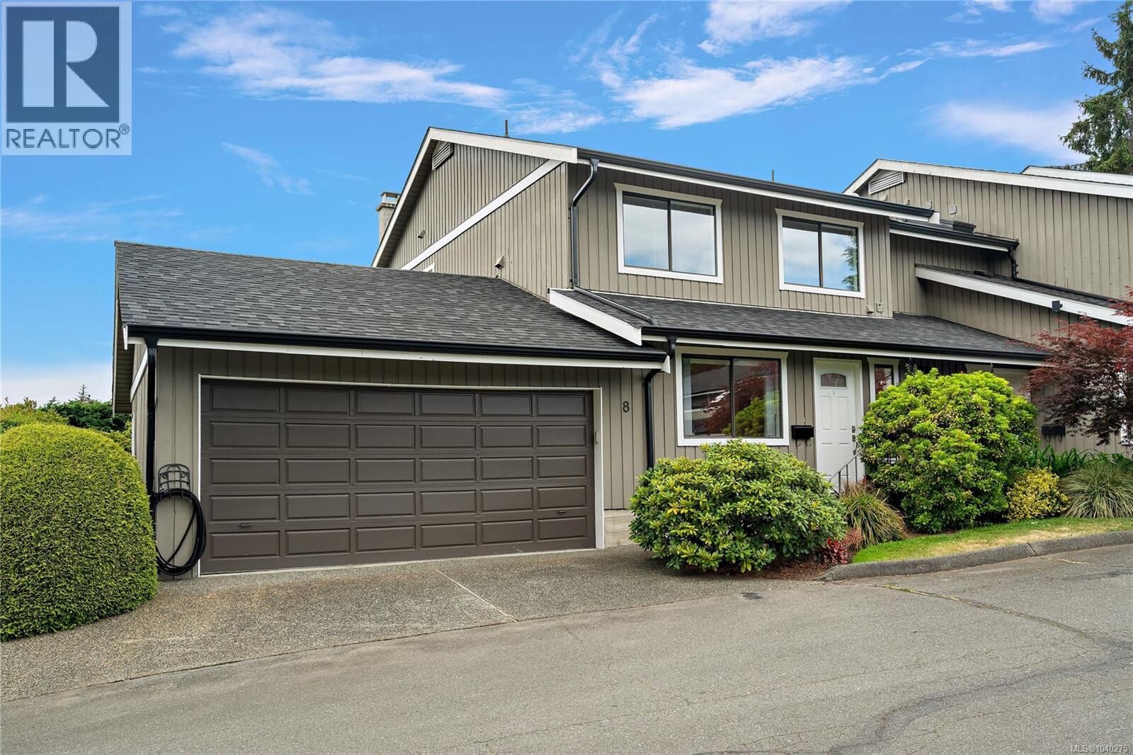 Property Photo: 1950 Cultra Avenue 8 BC V8M 1Y9