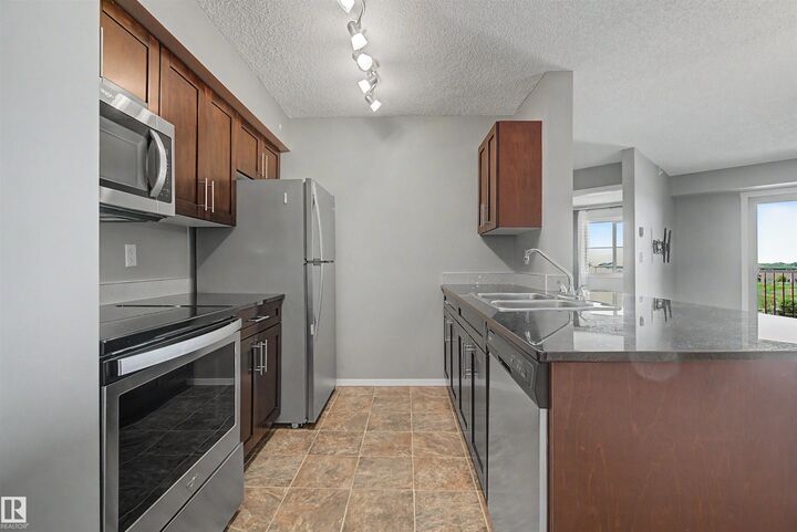 Property Photo:  5370 Chappelle Road SW 313  AB T6W 3L5 