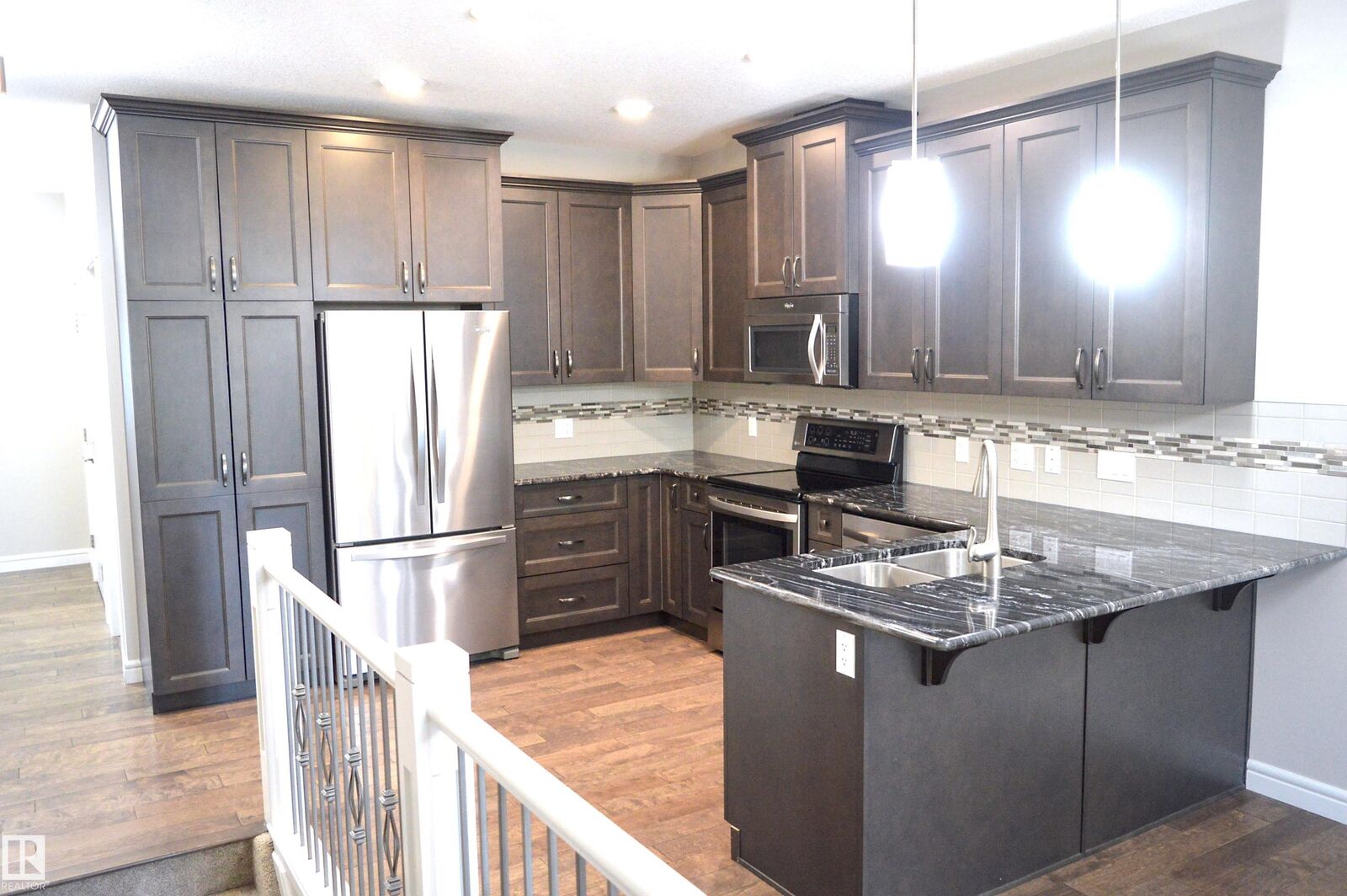 Property Photo: 7115 Armour Link Link SW 2 AB T6W 2V2