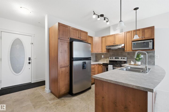 Property Photo:  802 12 Street 407  AB T9M 0A7 