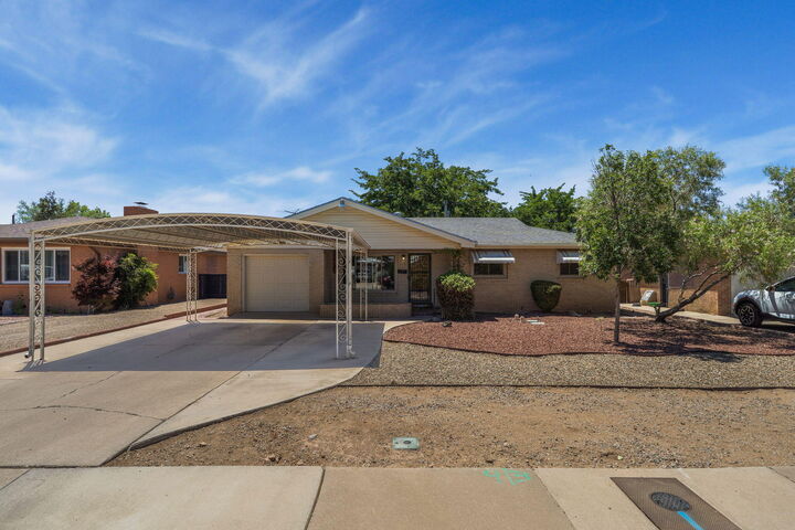 Property Photo:  2713 Valencia Drive NE  NM 87110 