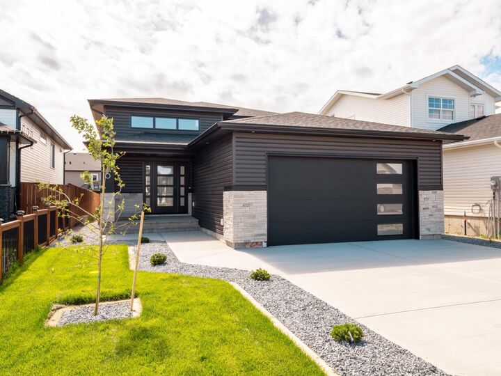 Property Photo: 26 Rivergrove Run W AB T1K 8E8