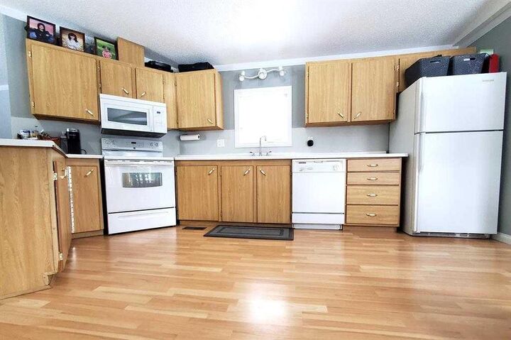 Property Photo: 67339 Mission Road 125 AB T0A 2C0