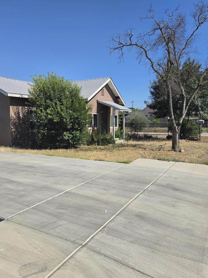 Property Photo:  1124 S 1st Avenue  CA 93618 