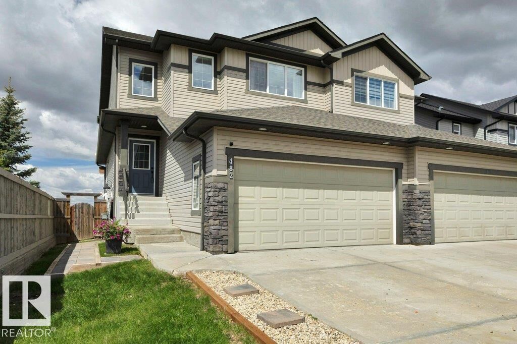 Property Photo: 482 Reed Cr AB T9E 0R5
