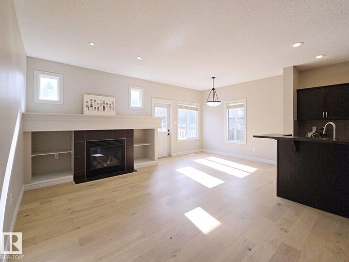 Property Photo:  11525 18A Avenue SW  AB T6W 2E6 