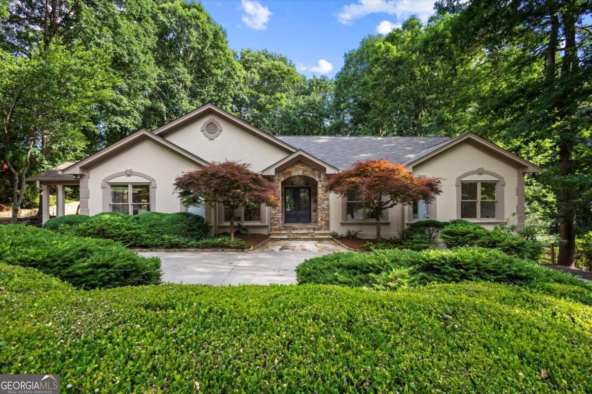 Property Photo:  8920 Huntcliff Trce  GA 30350 