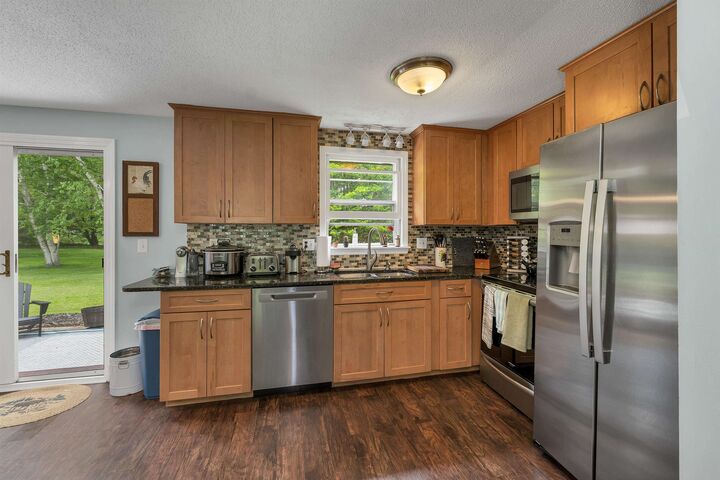 Property Photo:  8 Toftree Lane  NH 03820 