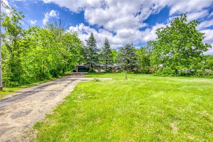 Property Photo:  5371 Dundas Street  ON L7R 3X4 