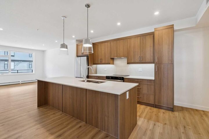 Property Photo:  3700 Seton Avenue SE 3209  AB T3M 4J1 