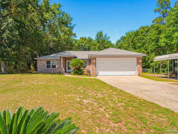 Property Photo:  6668 Delhi Dr  FL 32583 