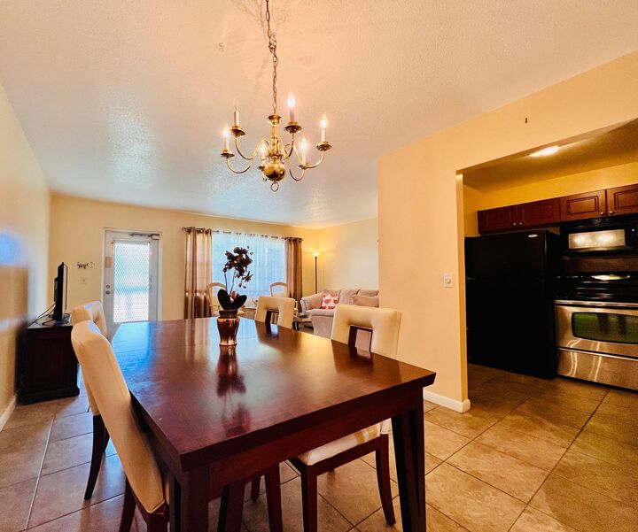 Property Photo:  142 Cambridge F  FL 33417 