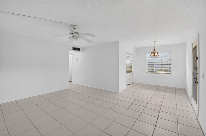Property Photo:  200 Normandy E 200  FL 33484 