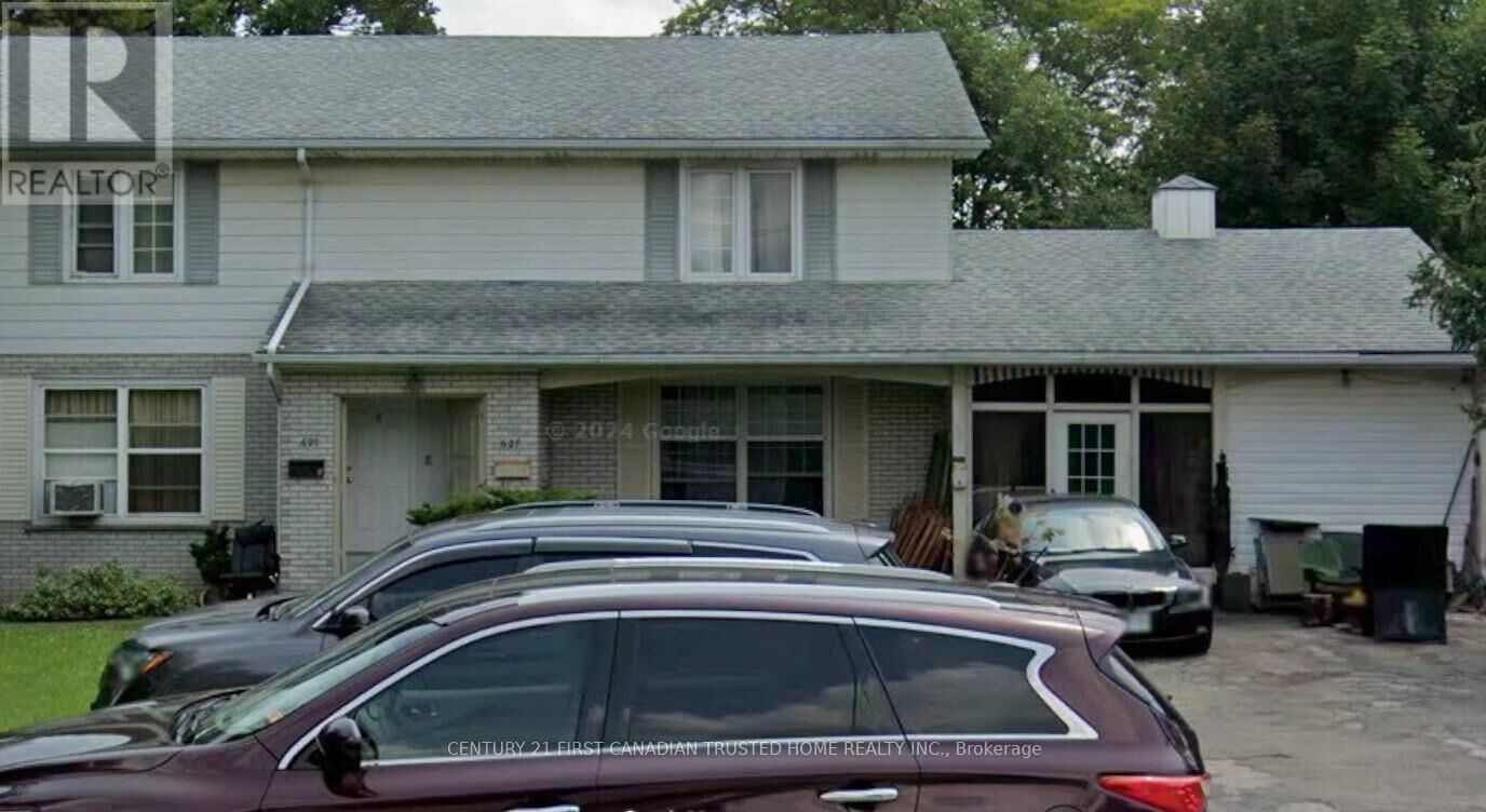 Property Photo: 627 Commissioners Road East 1 ON N6C 2T9