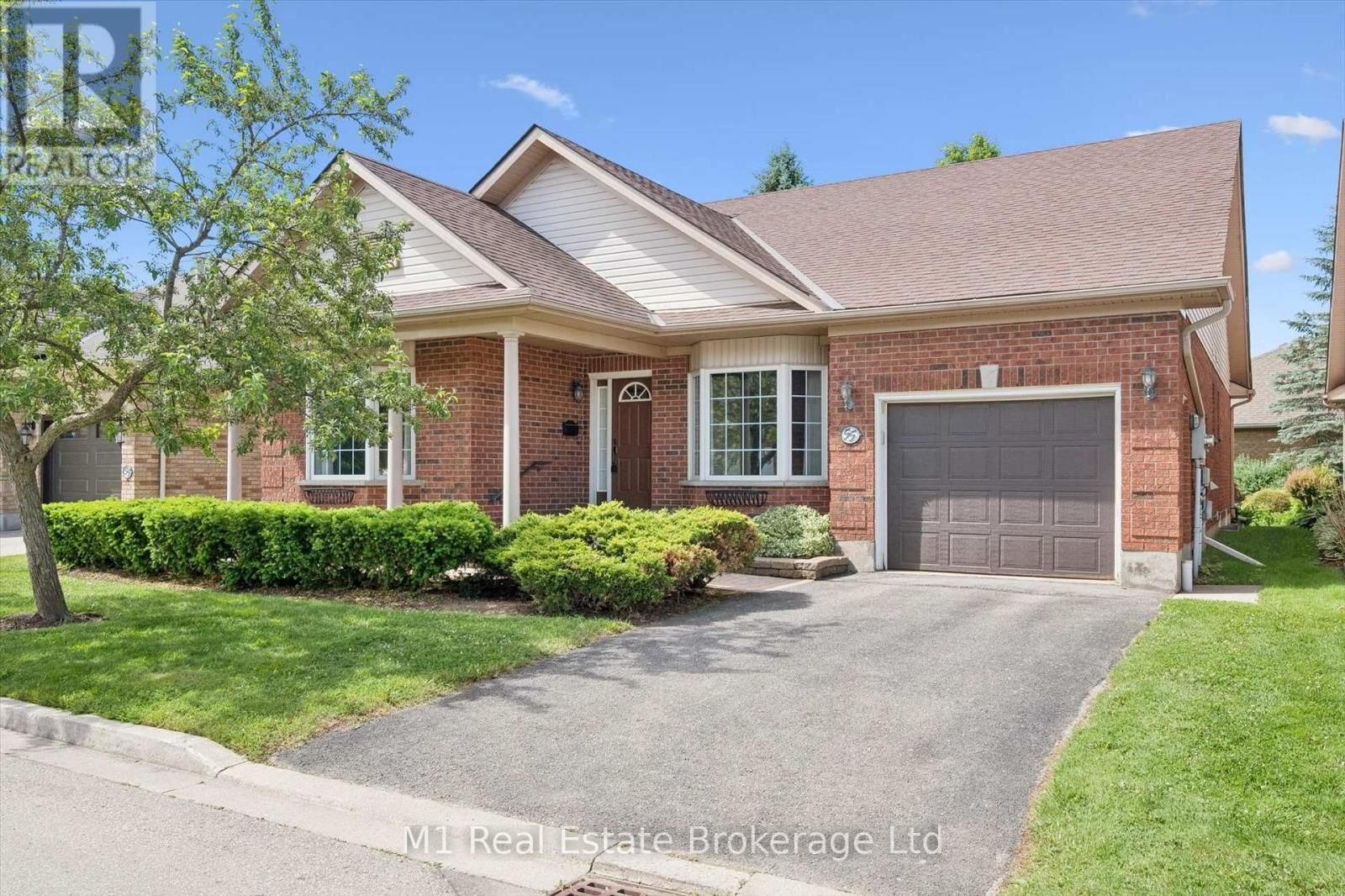 Property Photo: 55 Honeysuckle Drive ON N1G 4X7