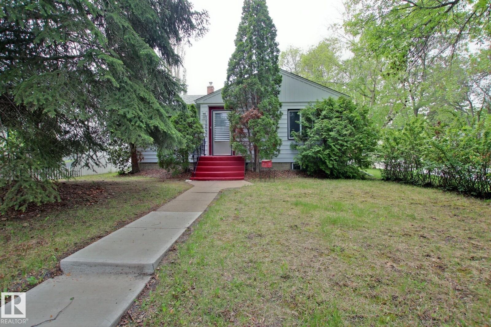Property Photo: 11242 56 Street NW AB T5W 3S2
