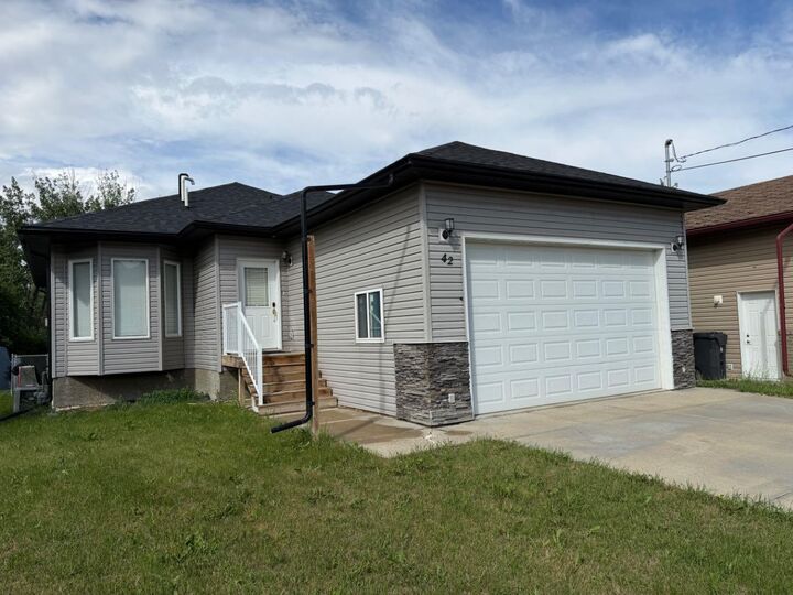 Property Photo: 42 A Red Deer Avenue AB T0J 2E0