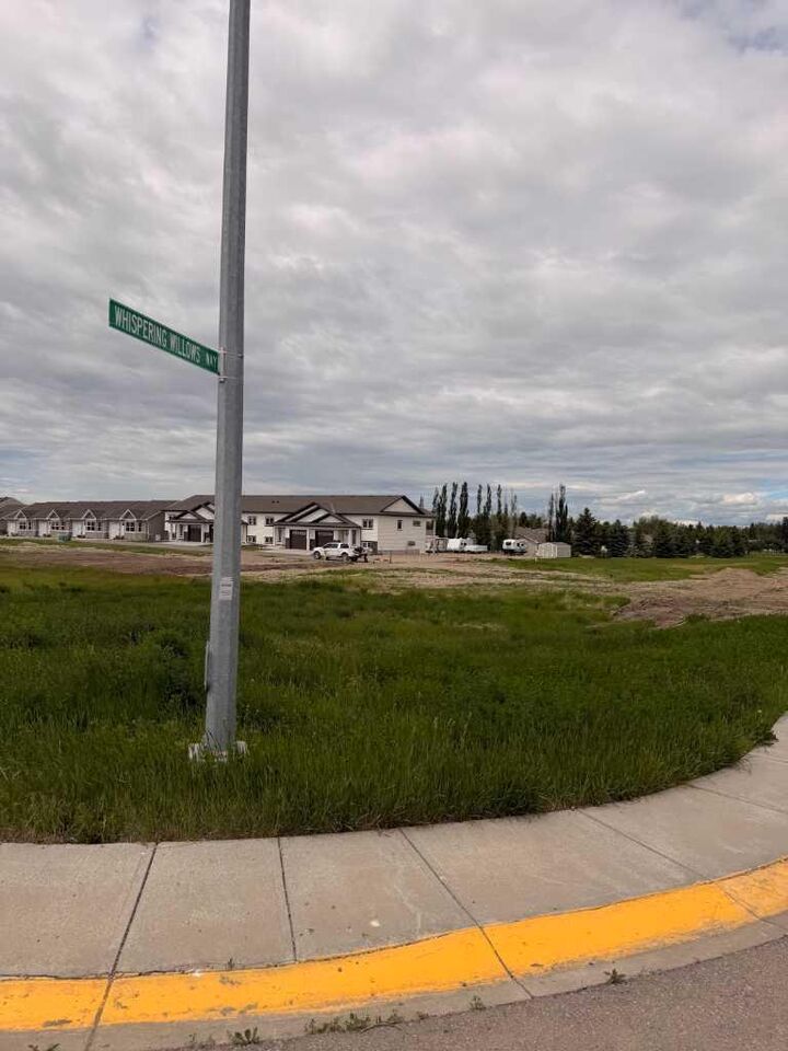 Property Photo:  602 Whispering Greens Avenue  AB T0L 2B0 