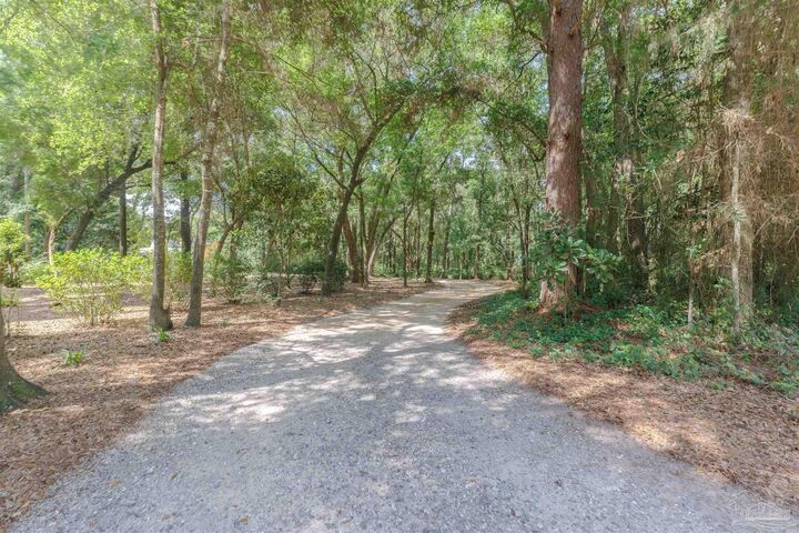 Property Photo: 5049 Guernsey Rd FL 32571