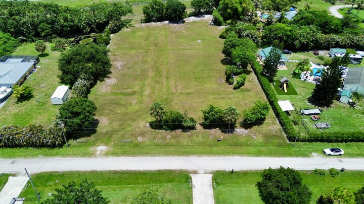 Property Photo: 16546 74th Avenue N FL 33418