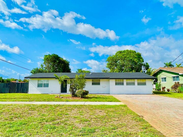 Property Photo: 1478 NE 56th Street FL 33334