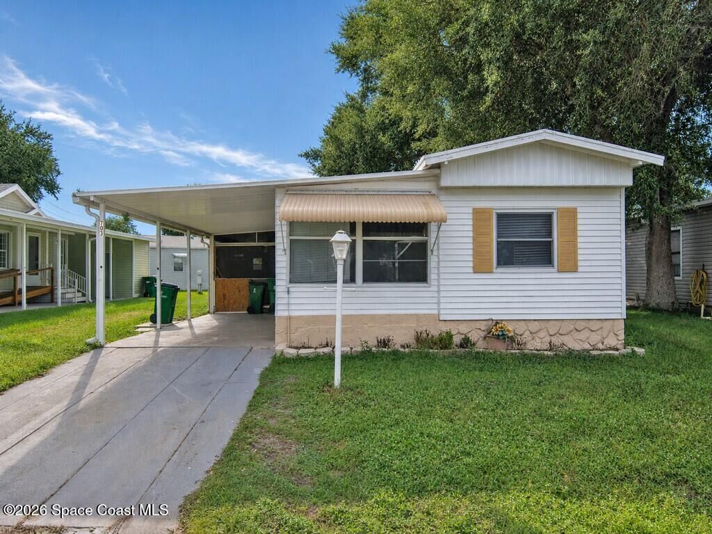 Property Photo: 703 Lark Drive FL 32976