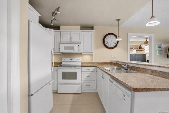 Property Photo: 4536 Viewmont Ave #204 BC V8Z 5L2