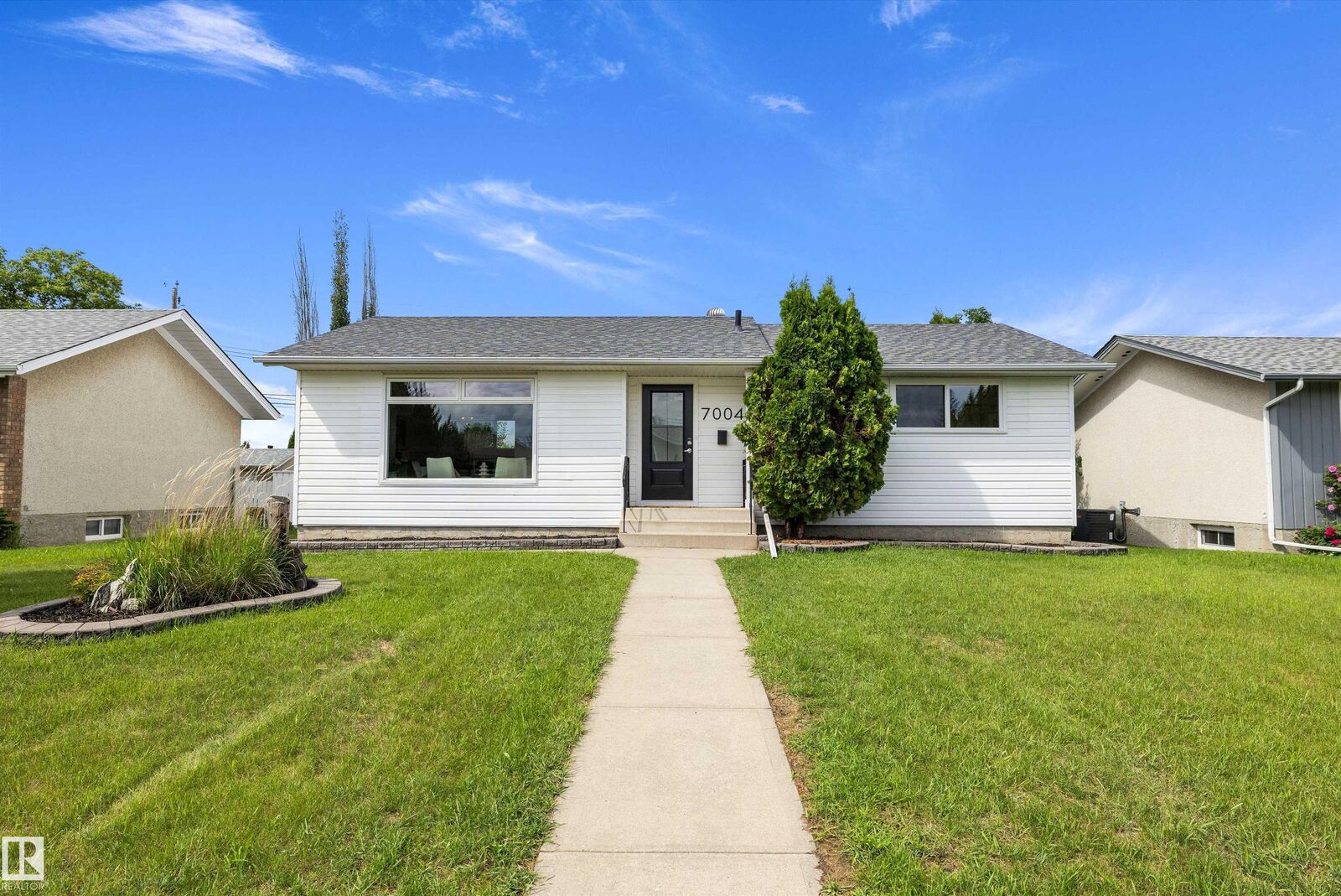 Property Photo: 7004 93 Avenue NW AB T6B 0W6