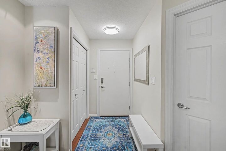 Property Photo:  2204 44 Avenue NW 210  AB T6T 0G5 