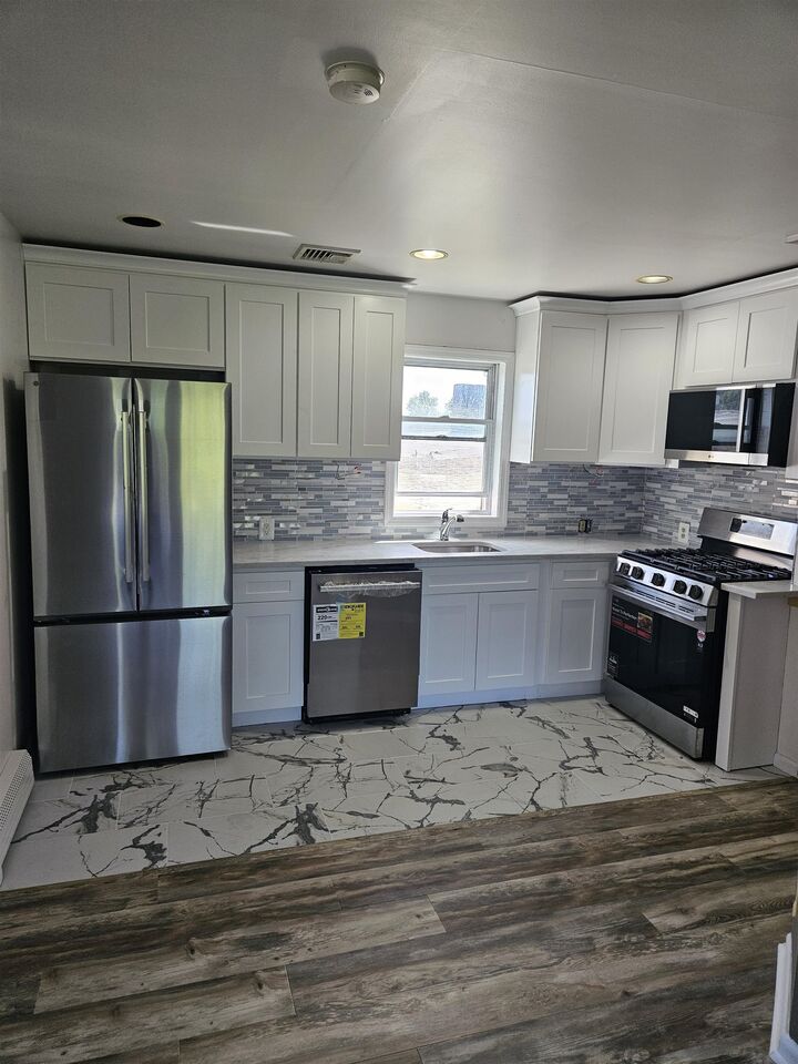 Property Photo:  5221 Grand Ave  NJ 07047 