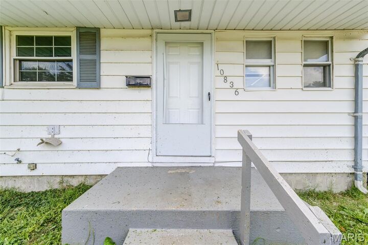 Property Photo:  10836 Spring Garden Drive  MO 63137 