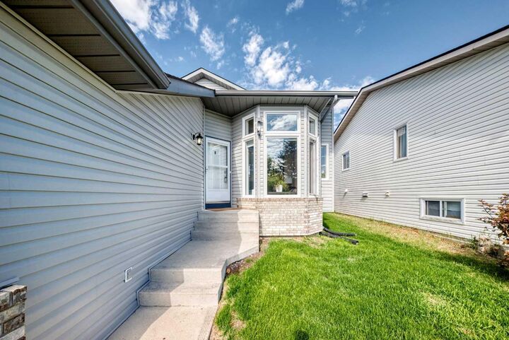 Property Photo:  47 Harvest Glen Rise NE  AB T3K 4C1 