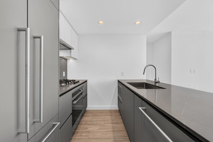 Property Photo:  2135 Springer Avenue 1908  BC V5B 2Z6 