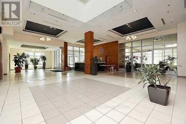 Property Photo: 1 Elm Drive West 1503 ON L5B 4M1
