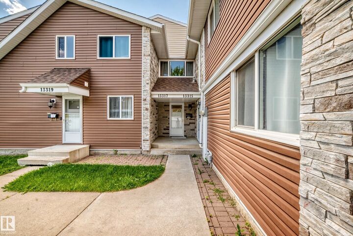 Property Photo: 13317 47 Street NW AB T5A 3L5