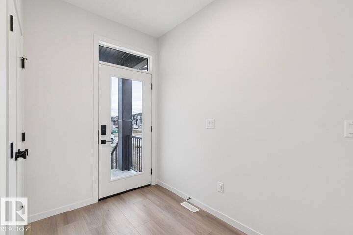 Property Photo: 7351 Klapstein Crescent SW AB T6W 5R8